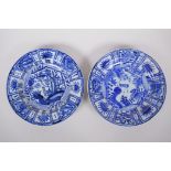 A pair of Chinese blue and white Kraak porcelain cabinet plates decorated with insects and birds