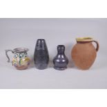 A mid century Denby Glyn College earthenware jug, two Silchester treacle glazed terracotta vases,