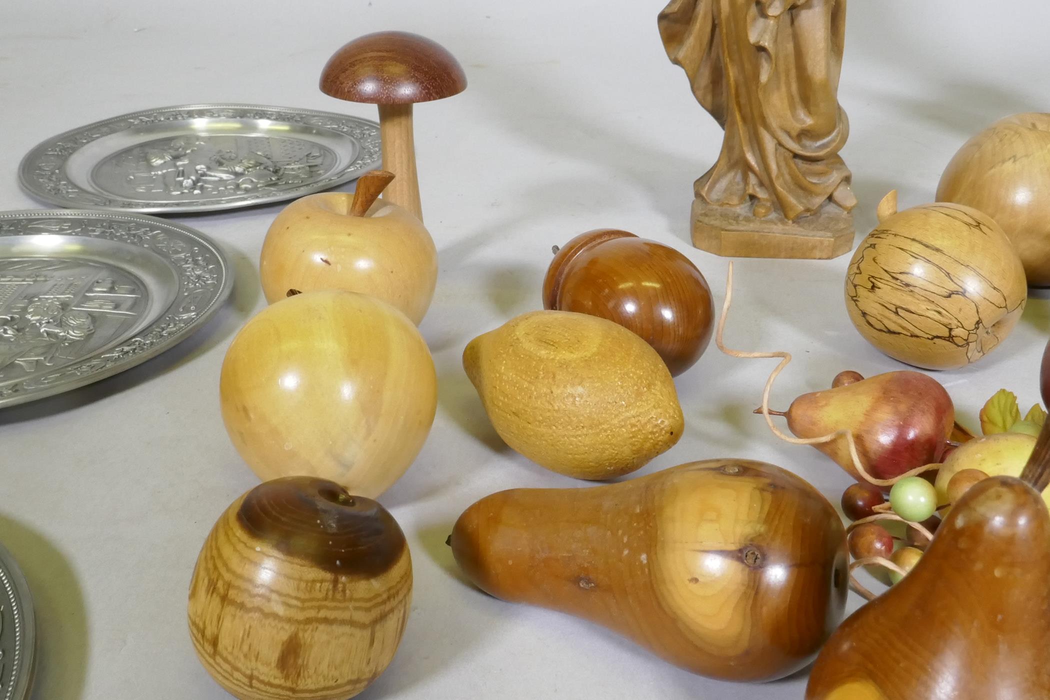 A collection of treen wood carvings of fruit, a composition model of a wood worker and a carved - Image 3 of 6