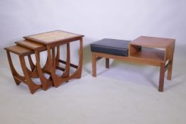 A nest of three G Plan Astro tile top teak tables, 50 x 50 x 50cm, and a mid century telephone