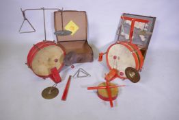 Two vintage National Jazz band 'The Robin Hood Outfit' child's one man band sets, in original cases,