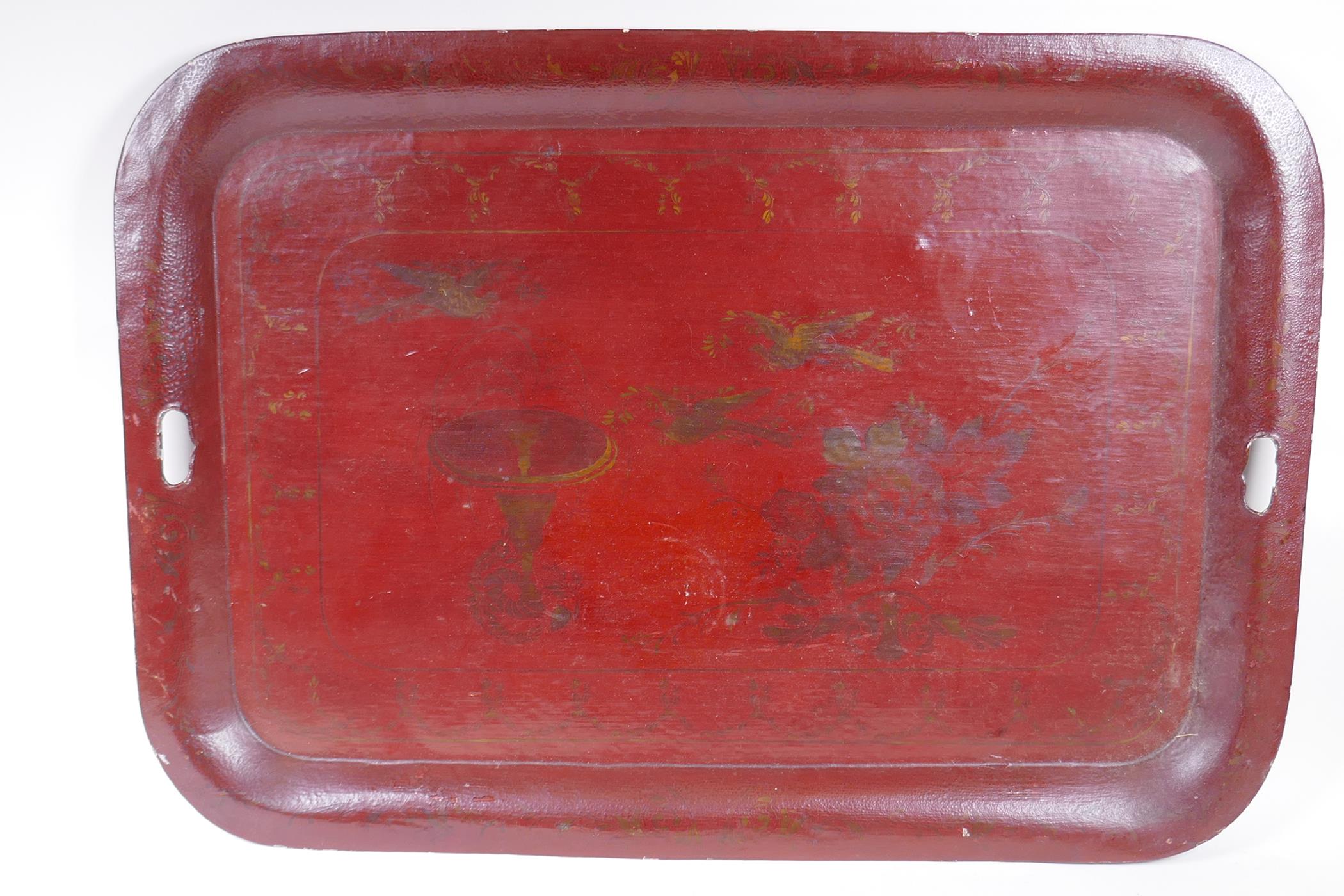 A red ground Toleware tray with gilt decoration of birds and a fountain, and another smaller, - Image 2 of 3