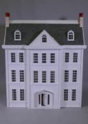 A large dolls' house, Tattershall Manor, in the form of a Georgian town house, the roof folding