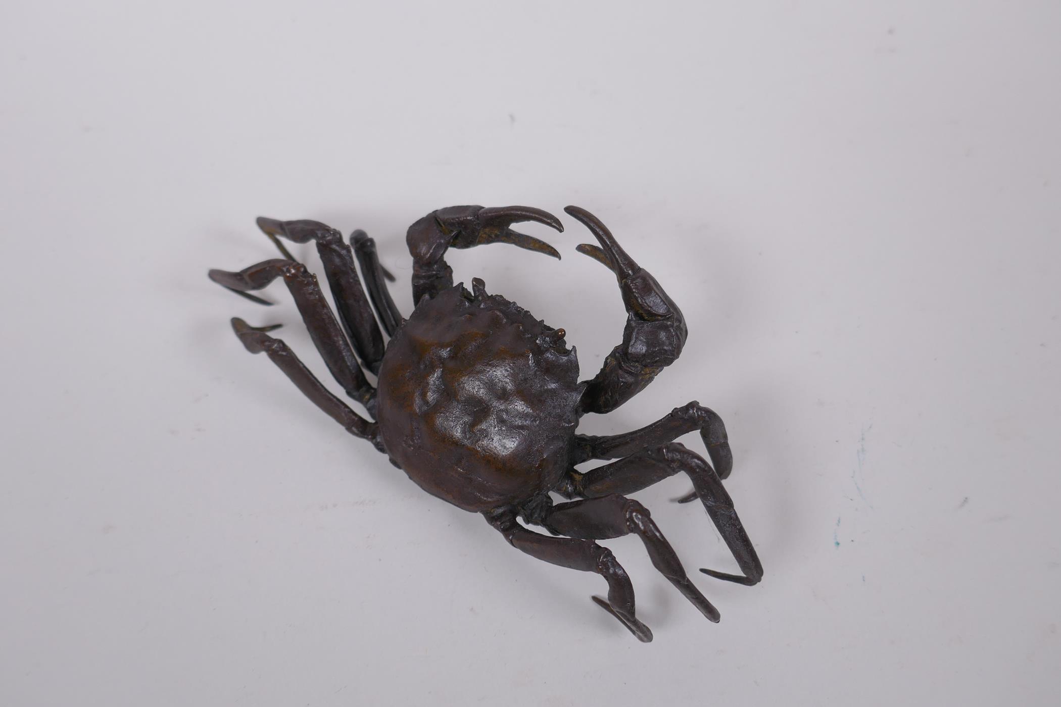 A Japanese style bronze okimono crab, 15cm wide
