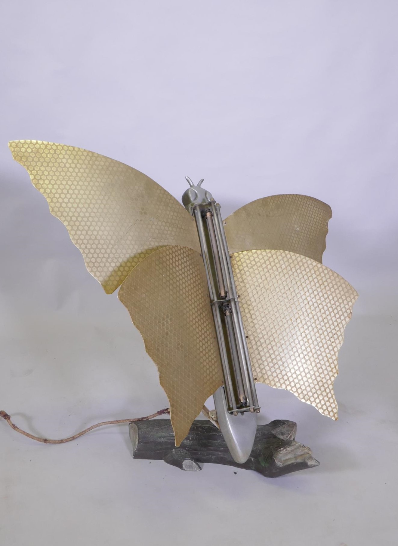 An Art Deco butterfly room heater, on an aluminium swivel arm, on a naturalistic log base, 77cm high - Image 2 of 3