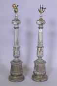 A pair of bronzed and painted metal table lamps, 68cm high