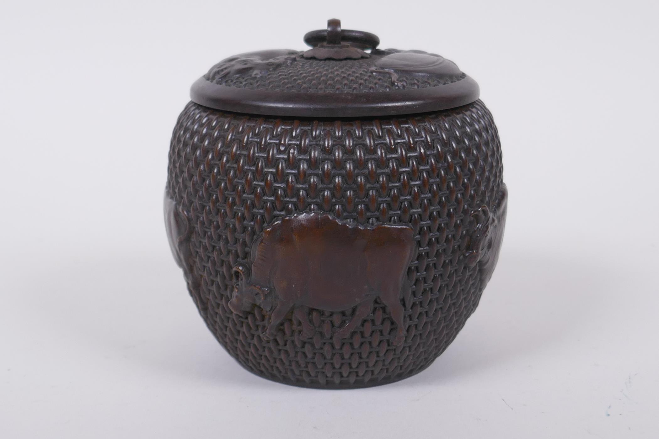A Chinese bronze jar and cover of basket form, with water buffalo decoration, impressed Xuande 4 - Image 3 of 7