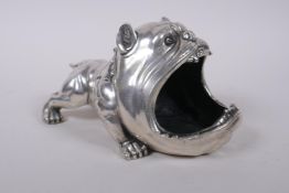 A silvered metal British bulldog pen rest/ash tray, 19cm long