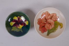 A Moorcroft Hibiscus pattern pin dish and a Moorcroft Magnolia pattern pin bowl
