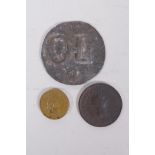 An C18th lead hop token, a brass Louis XIV 1 pistol coin, and a George III 1806 copper penny,