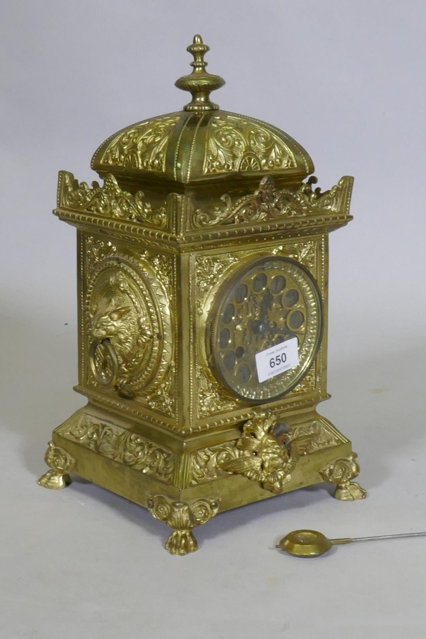 A C19th continental gilt brass mantel clock, the case with lion mask ring handles and raised - Image 2 of 4