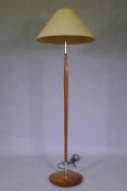A mid century teak standard lamp, 145cm high