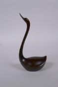 A Japanese style bronze okimono swan, mark to base, 15cm high