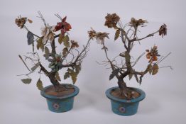 A pair of Chinese hardstone, jade and agate trees, in cloisonne planters, 38cm high