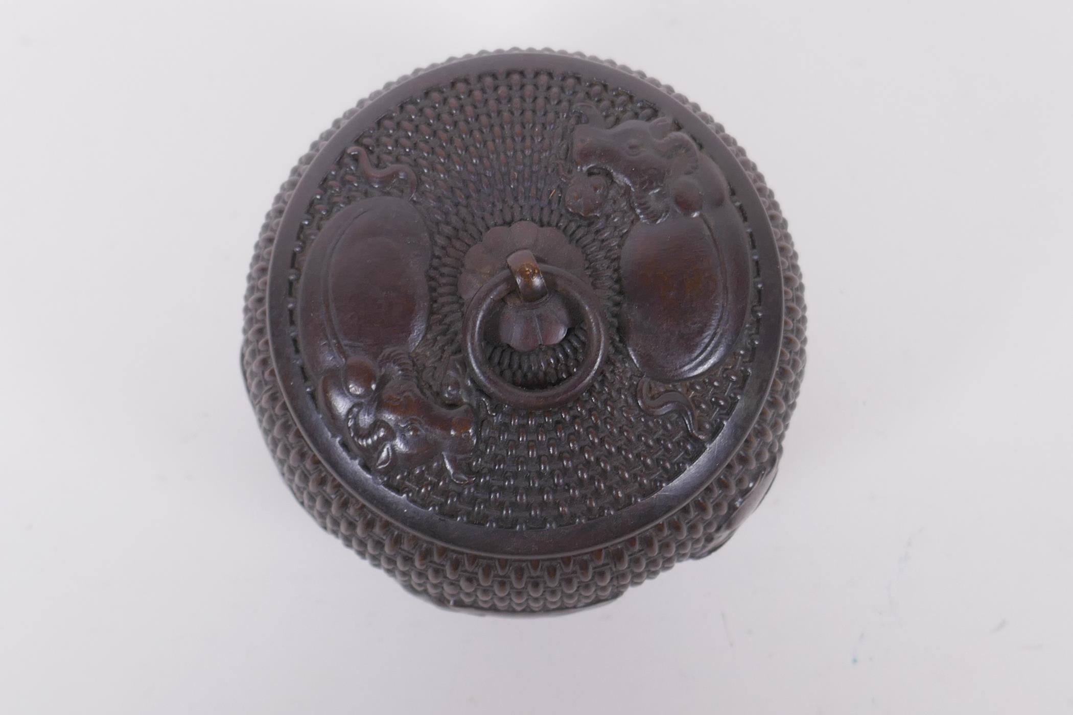 A Chinese bronze jar and cover of basket form, with water buffalo decoration, impressed Xuande 4 - Image 6 of 7