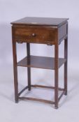 A Chinese hardwood lamp table with single drawer and undertier, 40 x 33 x 71cm