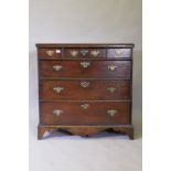 An early C19th oak chest of three over three drawers, with scratched and moulded detail on the