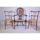 A Sheraton Revival wheelback arm chair, with satinwood and fan inlay and shaped arms and seat,