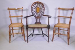 A Sheraton Revival wheelback arm chair, with satinwood and fan inlay and shaped arms and seat,