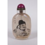 A Chinese reverse decorated glass snuff bottle with a portrait of an emperor, 9cm high