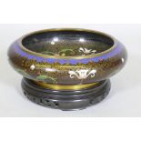 A Chinese cloisonne famille noire enamel bowl, four character mark to base, early C20th, 26cm