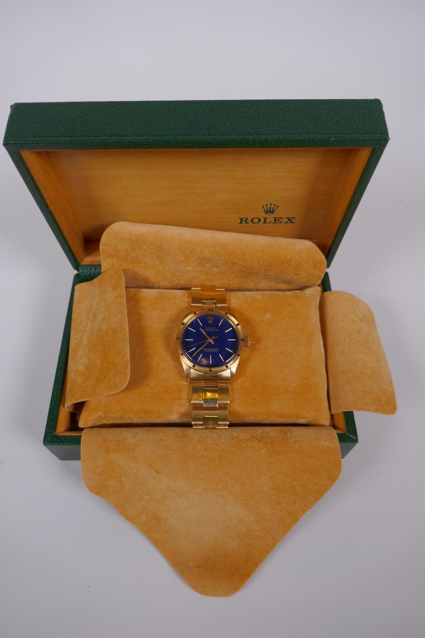 A gentleman's vintage 18ct gold Rolex Oyster Perpetual wrist watch with baton numerals, on a blue - Image 9 of 15