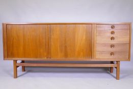 A mid century Scandinavian teak 'Oden' sideboard by Nils Johsson for Troeds, with tambour front