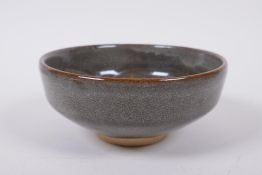 A Chinese Jizhou kiln black glazed bowl, indistinct seal mark to base, 15cm diameter