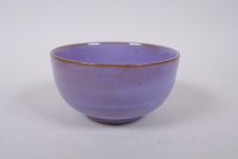 A Chinese jun ware style lilac flambe glazed bowl, 13cm diameter