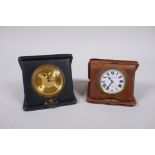 A Mappin gilt brass travel clock in a leather case, with illuminated hands and Arabic numerals,