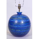 A mid century blue glazed pottery table lamp, possibly Bitossi, by Aldo Londi, 35cm high