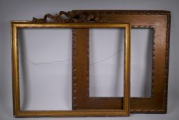 An Arts and Crafts giltwood picture frame, and an early C20th gilt frame with bow surmount,