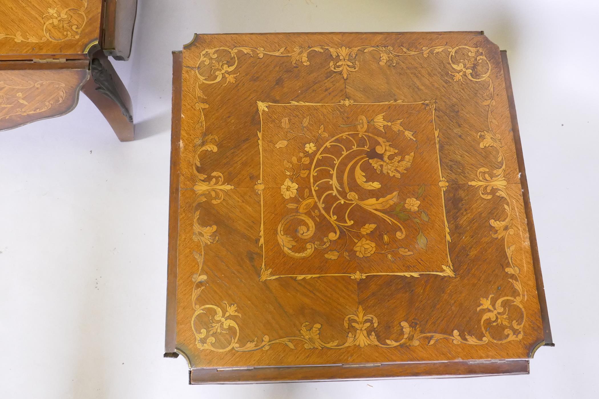 A pair of antique marquetry inlaid kingwood tables with a shaped top and ormolu mounts, reduced, - Image 3 of 5