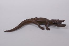 A Japanese style bronze okimono crocodile, 18cm long