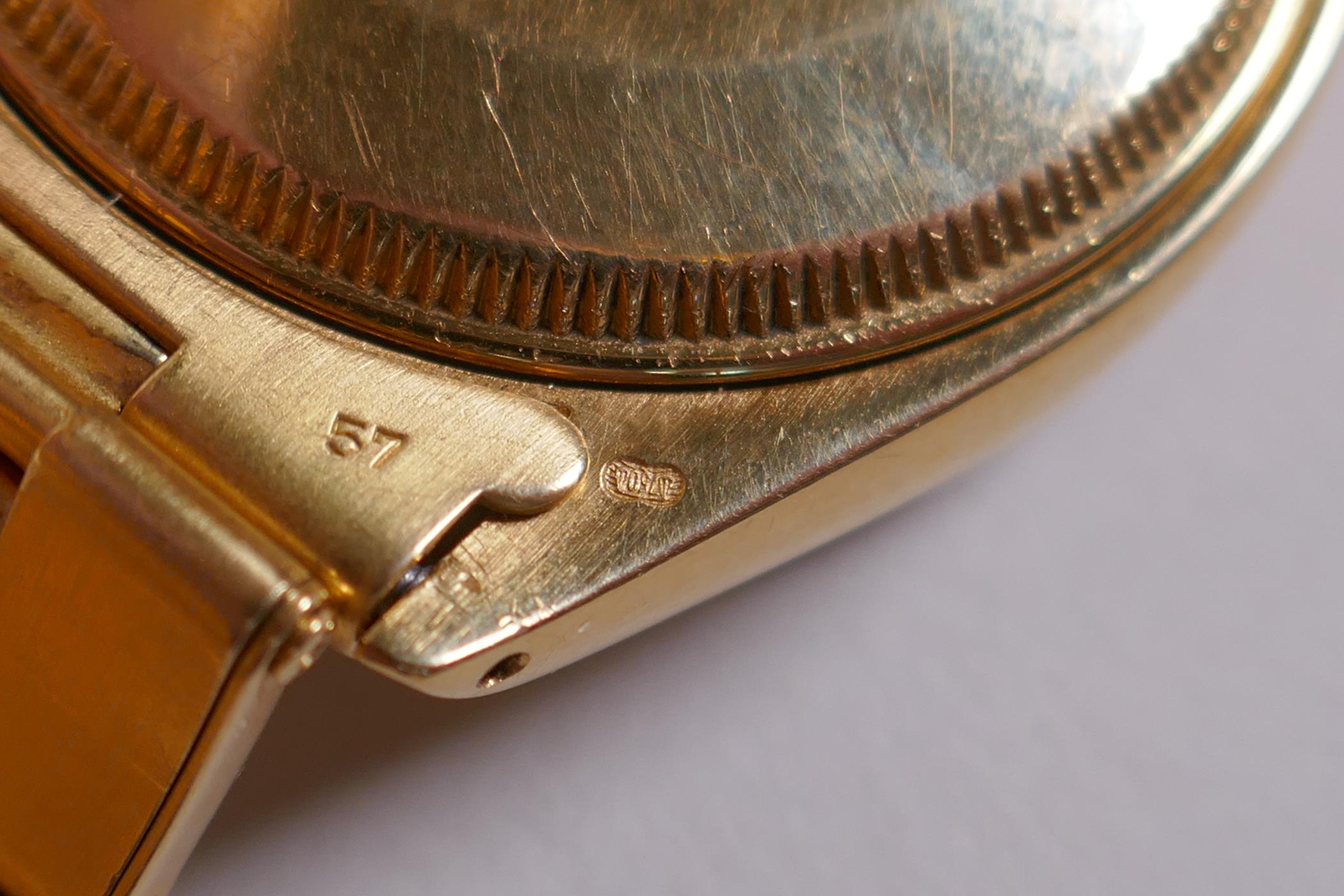 A gentleman's vintage 18ct gold Rolex Oyster Perpetual wrist watch with baton numerals, on a blue - Image 5 of 15