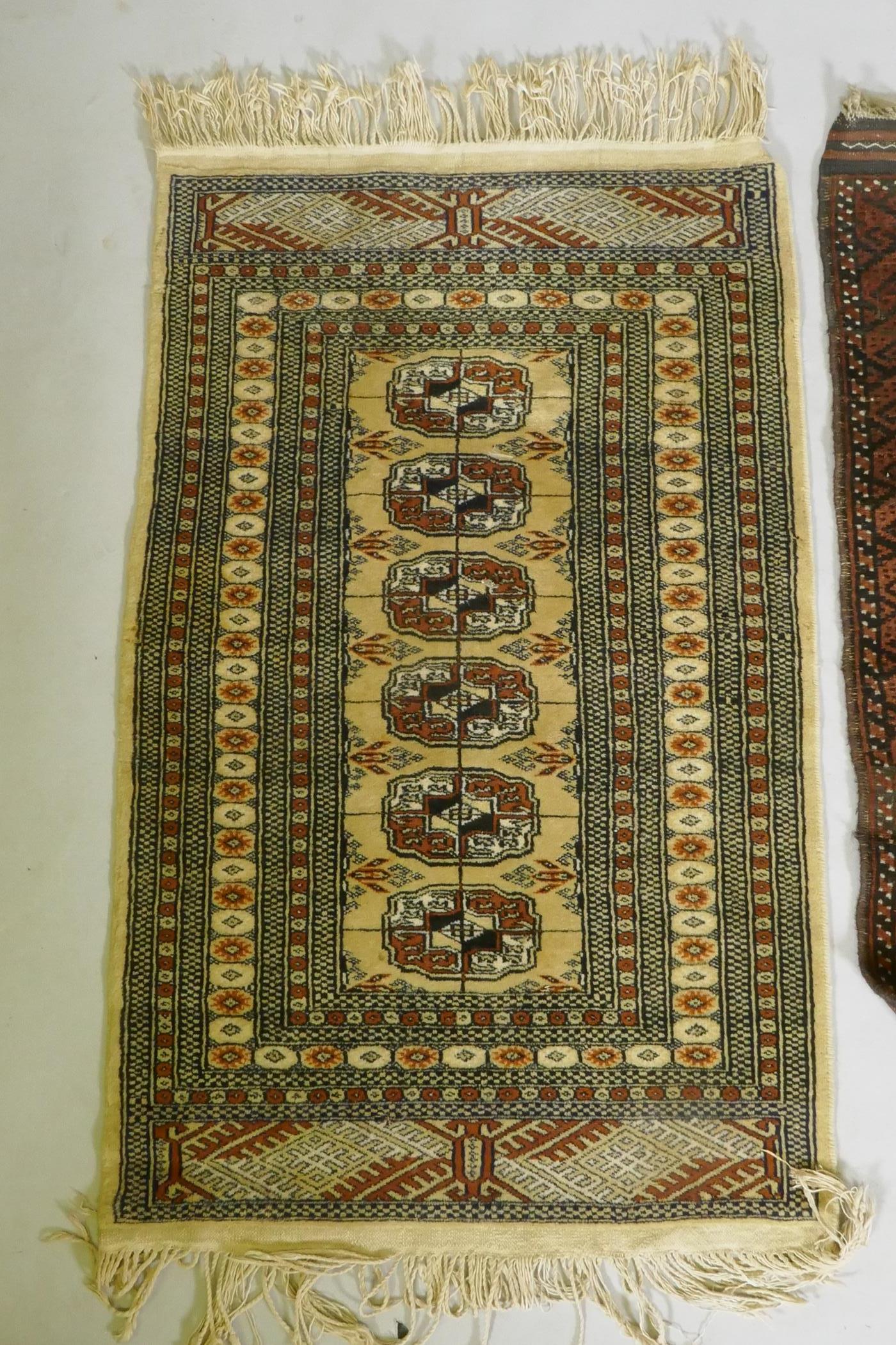 A gold ground Bokhara rug, and an Iranian rust and cream ground wool rug with an allover geometric - Image 6 of 7