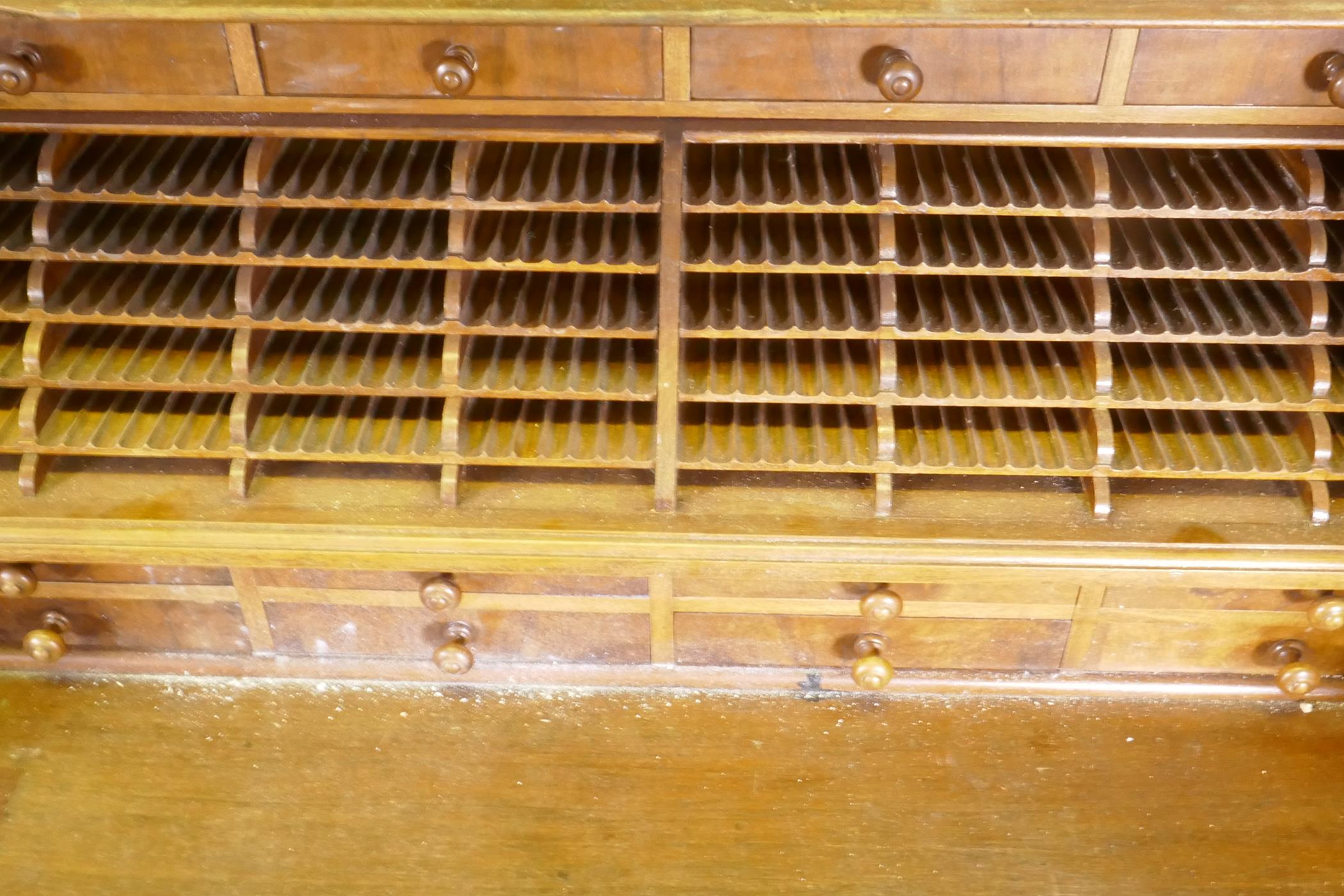 A late C19th/early C20th walnut tobacconist's shop cabinet, the roll top opening to reveal drawers - Image 4 of 5