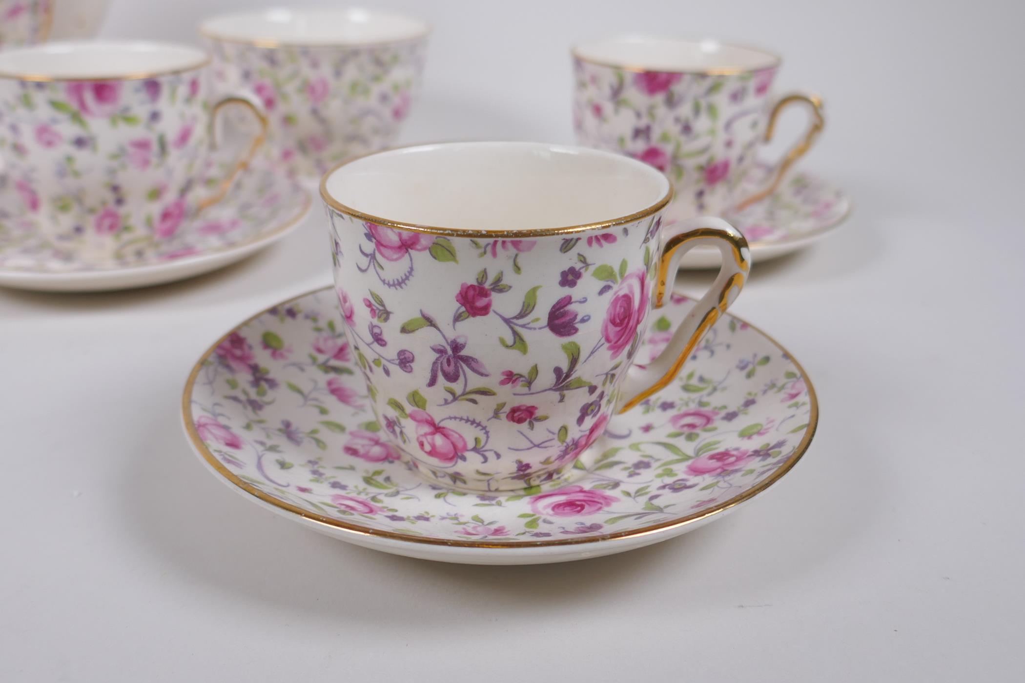 An Arklow pottery six piece coffee set with a transfer printed rose decoration, one cup different, - Image 3 of 7