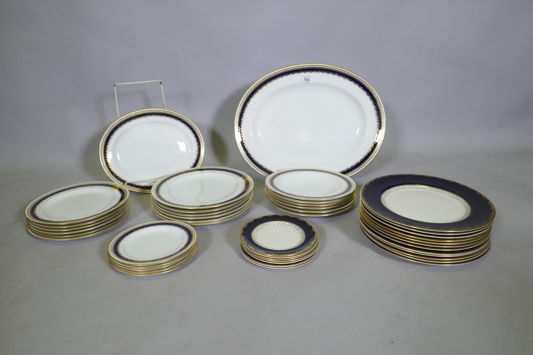 A Royal Crown Derby part dinner service, and Johnson Bros 'Pareek' plates and side plates