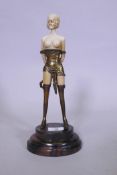 After Bruno Zach, Riding Crop, erotic composition and metal figure, 33cm high