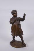 After Jose Cardona (Spanish, 1878-1923), boy with a slingshot, antique bronze, signed, lacks