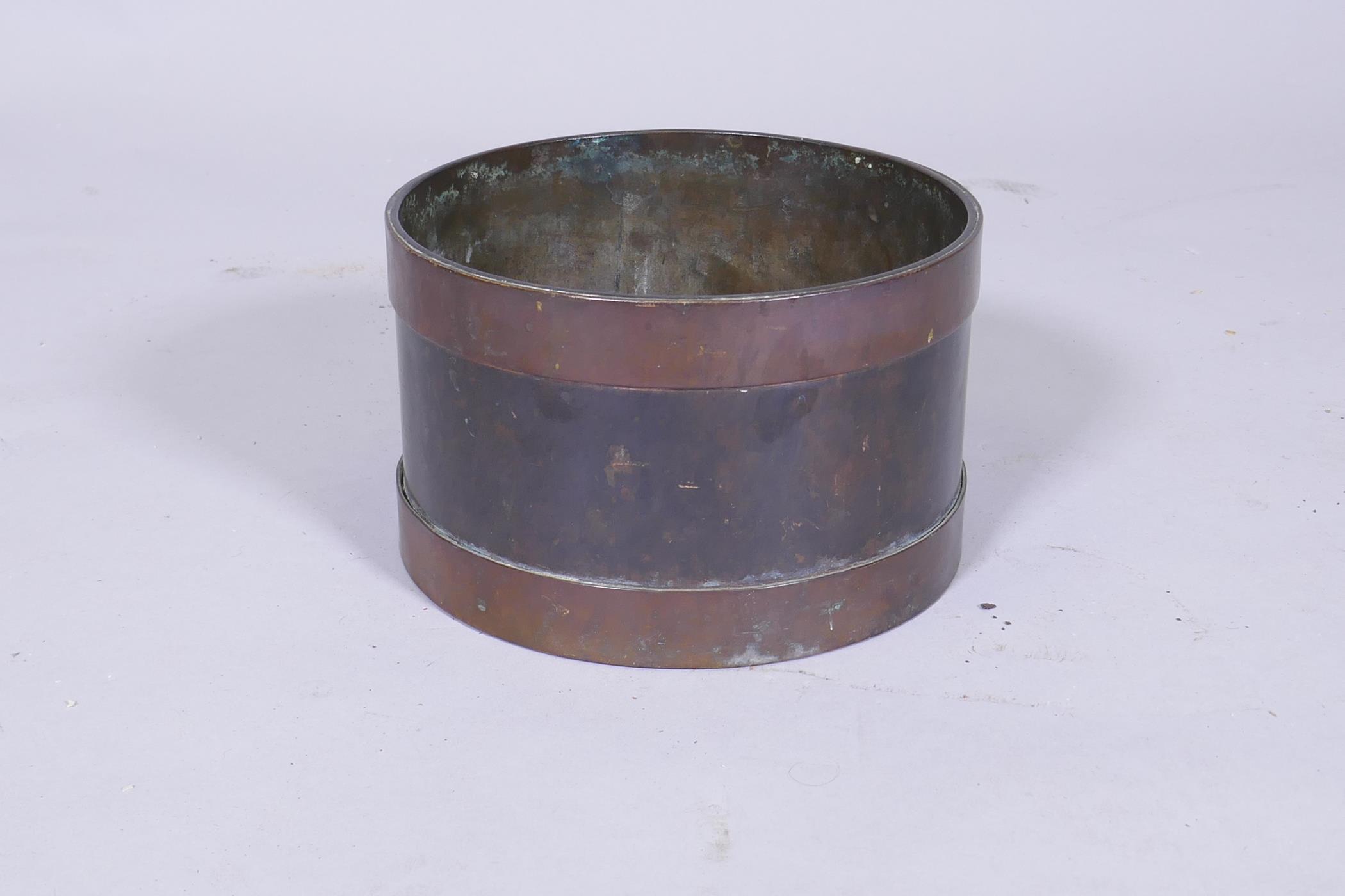 A C19th bronze and copper pot/planter with good patination, 19cm diameter, 12cm high