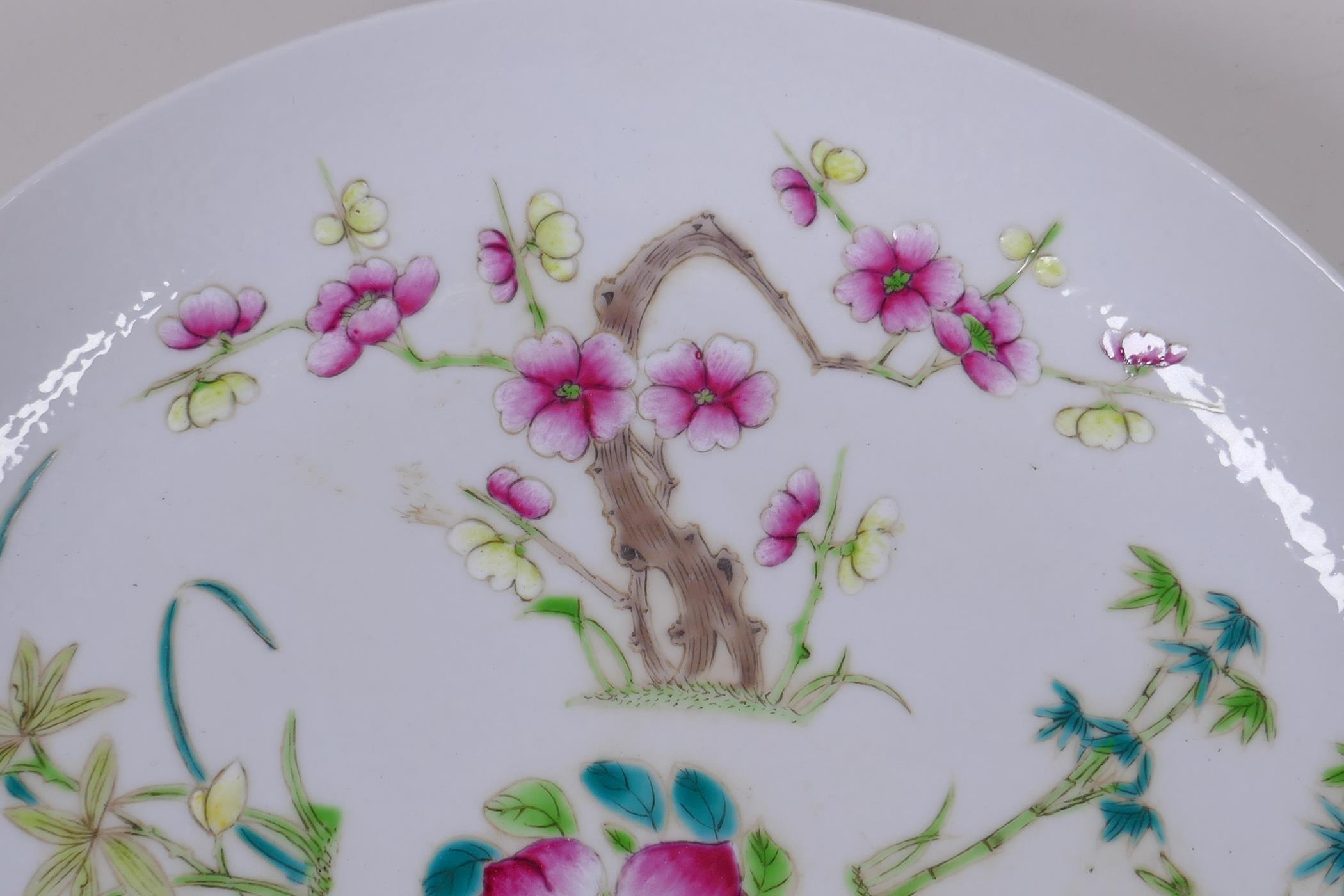 A Chinese late C19th famille rose porcelain cabinet plate decorated with peaches, bats, bamboo and - Image 3 of 8