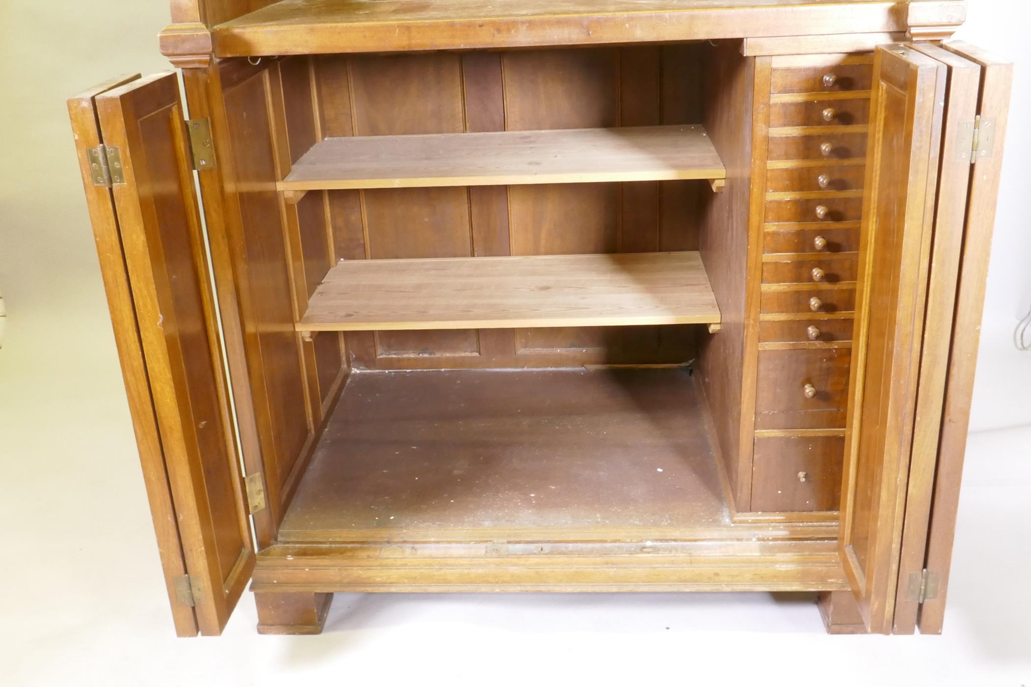 A late C19th/early C20th walnut tobacconist's shop cabinet, the roll top opening to reveal drawers - Image 5 of 5