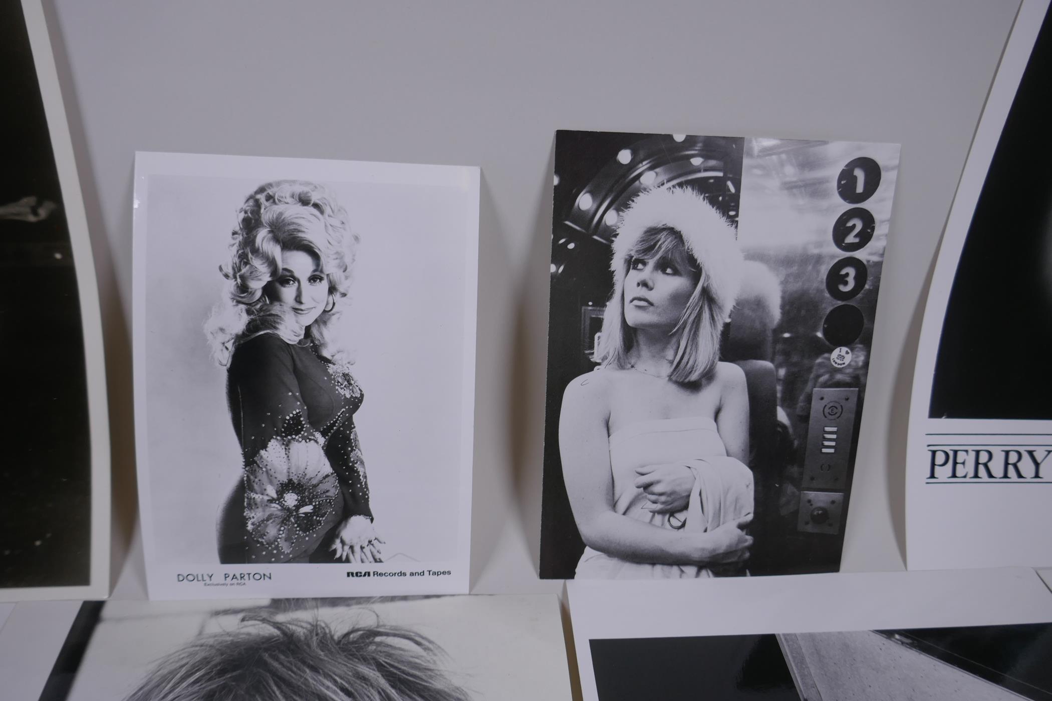 A quantity of black and white press and promotional photographs of musicians including Dolly Parton, - Image 5 of 7