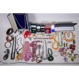 A collection of vintage costume jewellery including some silver jewellery, necklaces, rings etc