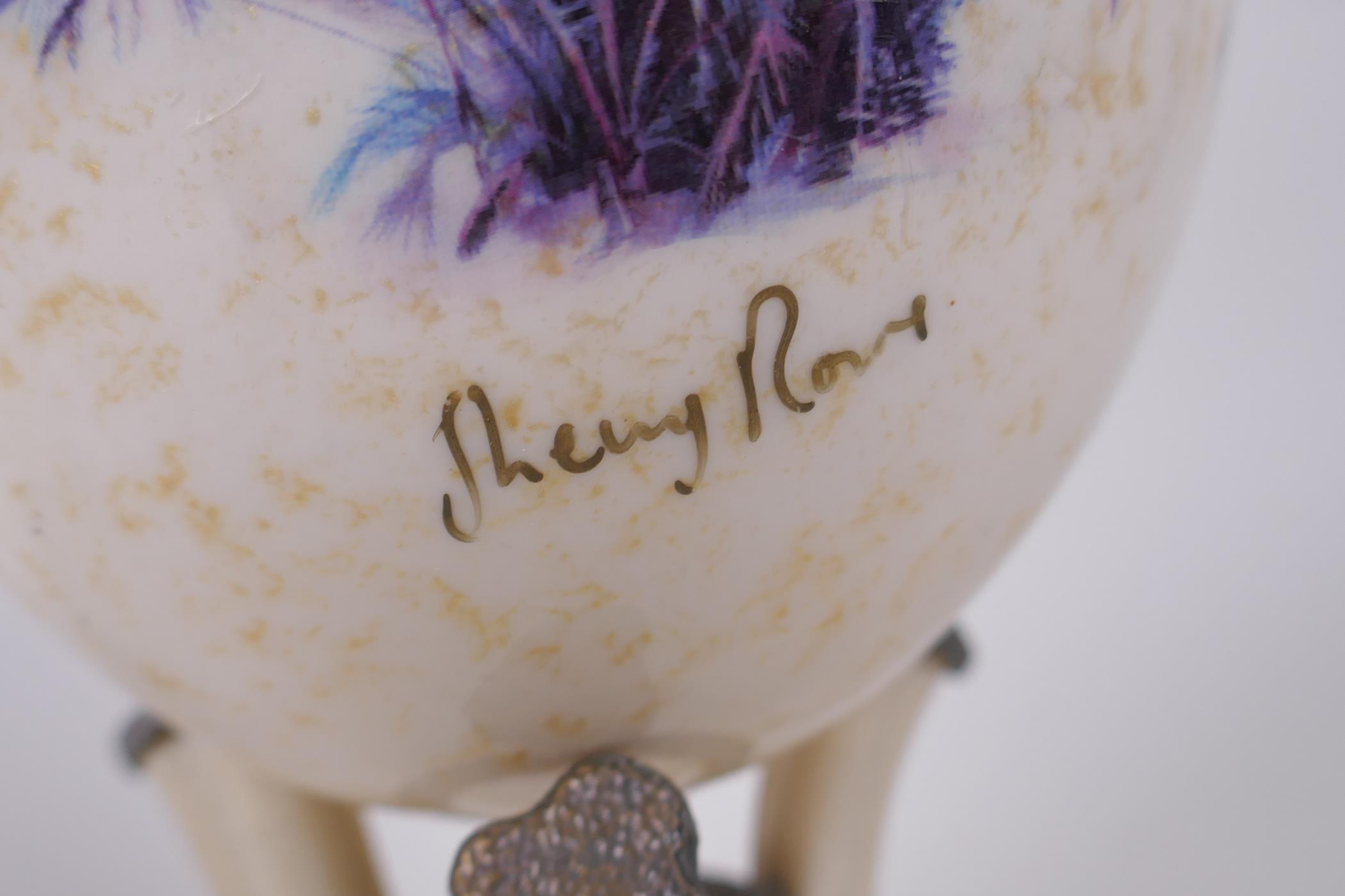 A decorative gilt and collage ostrich egg on stand by Sherry Rowe, and another undecorated ostrich - Image 6 of 7