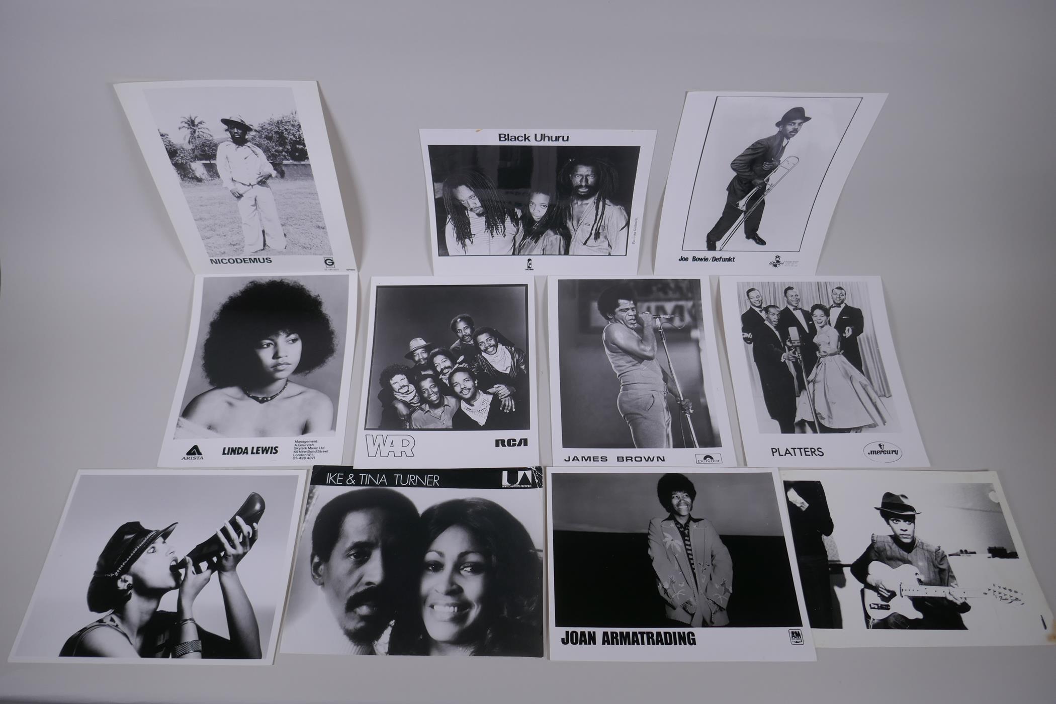 A quantity of black and white press and promotional photographs of black musicians including WAR,