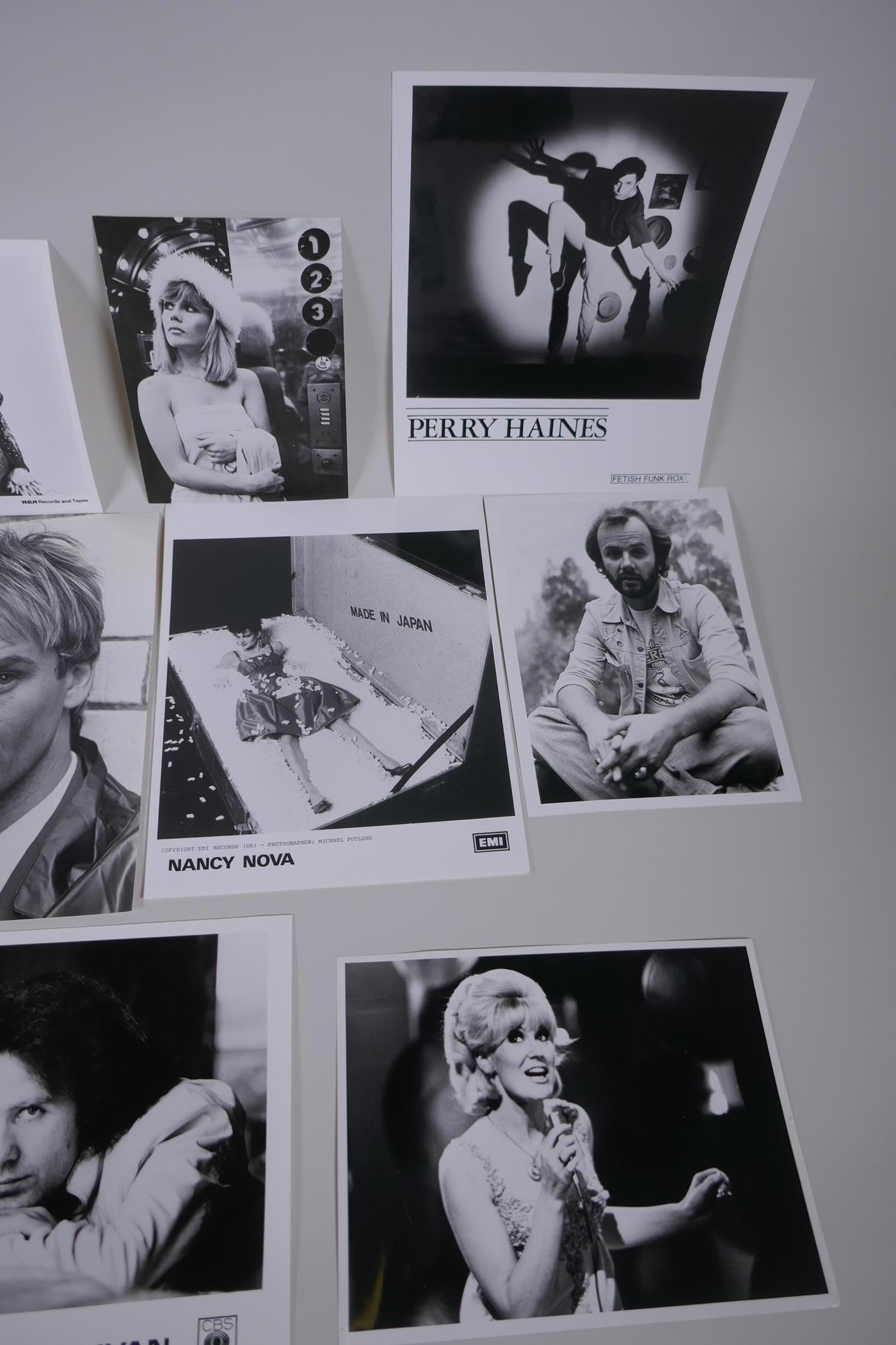 A quantity of black and white press and promotional photographs of musicians including Dolly Parton, - Image 6 of 7