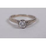 An 18ct white gold and diamond solitaire ring, size N/O